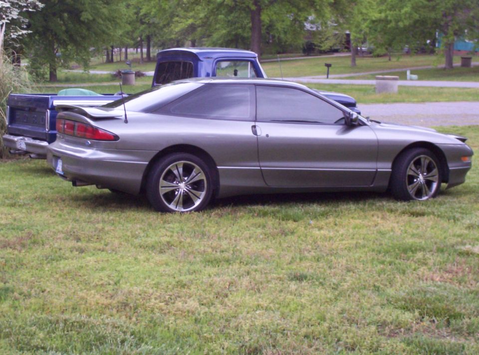 Gray 1995 Ford Probe coupe, side view, with spoiler
