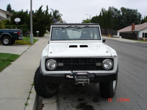 1968 Ford Bronco - This 1968 Ford Bronco is presented in a front-facing view, equipped with a Ramsey winch mounted on its bumper.