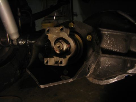 1979 Ford Bronco - Close-up view of a differential housing and driveshaft yoke assembly.