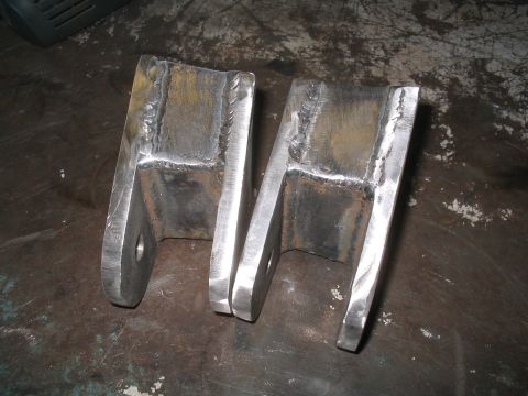 1979 Ford Bronco - Custom welded metal brackets, likely for a vehicle modification or repair.