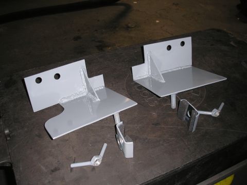 1995 Ford Bronco - Two fabricated hi lift mount brackets and associated hardware are shown.