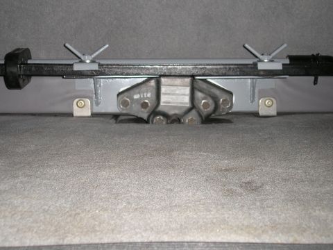 1995 Ford Bronco - A hi lift jack mount is secured to a vehicle's frame.