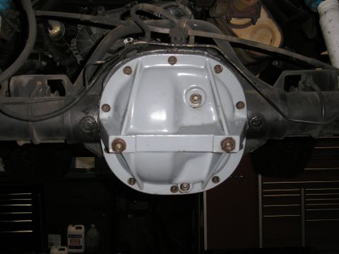 1995 Ford Bronco - Close-up of a vehicle's rear differential cover, painted gray.