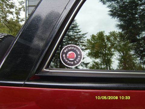 1989 Ford Bronco - A sticker on the window of a red vehicle shows the date 10/05/2008.