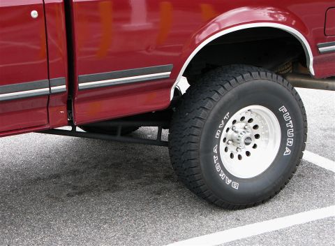 1991 Ford F-150 - This 1991 Ford F-150 is shown from the side, highlighting its wheel and body trim.