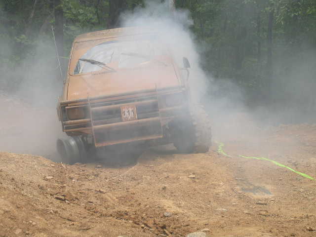 When you're missing a tire and have open diffs, it really doesn't matter how had you mash the skinny pedal.