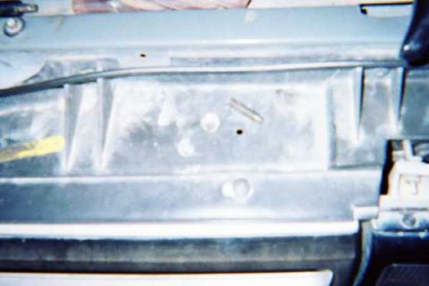 1988 Ford Bronco - The plenum bolt that had to be drilled out. The star pattern was stripped so we drilled it out.