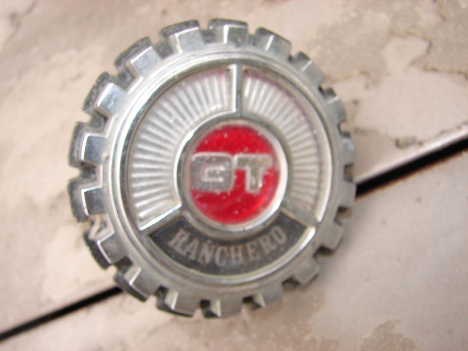 Close-up of a Ford Ranchero GT emblem.