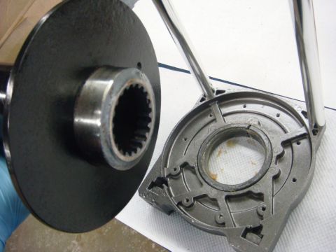 1996 Ford Bronco - Photograph of winch drivetrain parts during assembly, not a technical document.