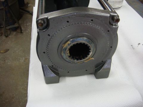1996 Ford Bronco - Workshop photo of a winch gearbox housing with splined bore, not a technical document.