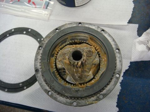 1996 Ford Bronco - Workshop photo of a grease-packed winch gearbox interior, not a technical document.
