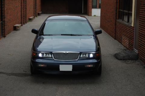 1985 Mercury Grand Marquis - This Mercury Grand Marquis has a distinctive grille and headlight design from the mid-1990s.