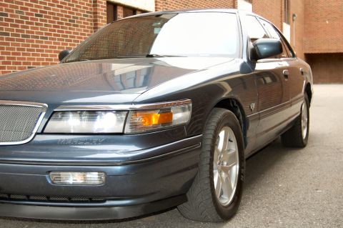 1985 Mercury Grand Marquis - This sedan's body style suggests a model year around 2000, not 1985 as claimed.