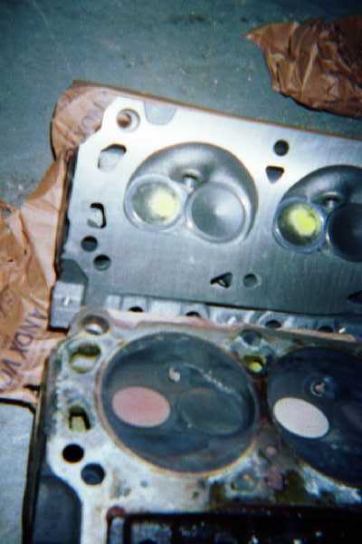 1988 Ford Bronco - Comparison of the intake and exhaust valves between the two.