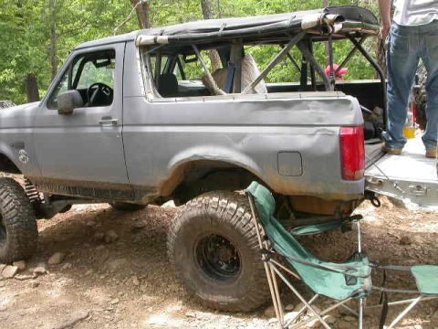 1990 Ford Bronco - This is the way to watch the race; from the back of the Bronco with the soft top sides rolled up. Notice the pillow in the back. Johnski ha…
