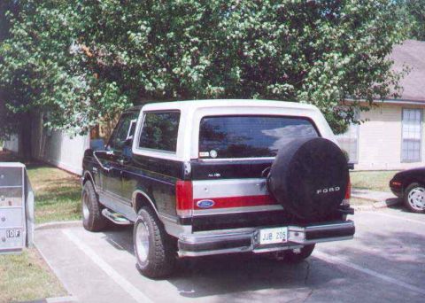 1990 Ford Bronco - Rear view of a 1990 Ford Bronco parked in a lot.