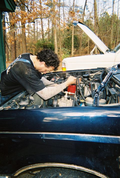 1988 Ford Bronco - That's Shane priming the oil pump.