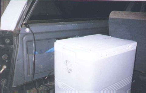 1990 Ford Bronco - A detail shot of a white object within the cabin of a vehicle.