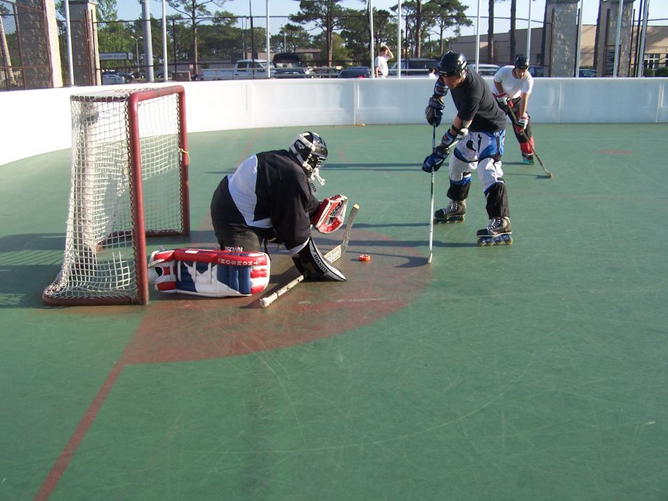 Roller hockey game on an outdoor rink