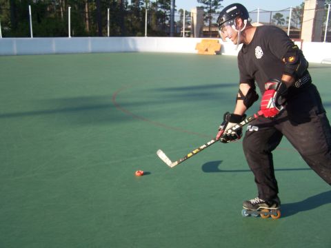 1973 Ford Ranchero - A person in roller hockey gear plays on an outdoor court.