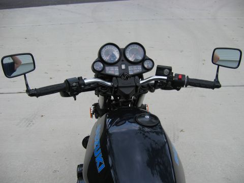 1985 Ford LTD Crown Victoria - Photograph of a motorcycle cockpit with handlebars and gauges, not a technical document.