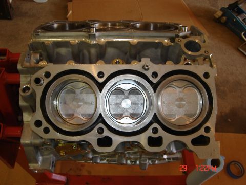 1993 Ford Probe - Engine block with pistons, possibly from a Ford Probe, shown in detail.