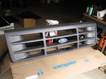 1993 Ford Bronco - This is a grille for a 1993 Ford Bronco, the iconic blue Ford oval badge.