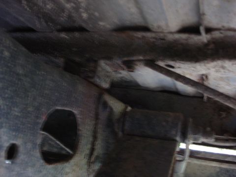 1981 Ford F-250 - Close-up of the undercarriage, showing frame rails and suspension parts.