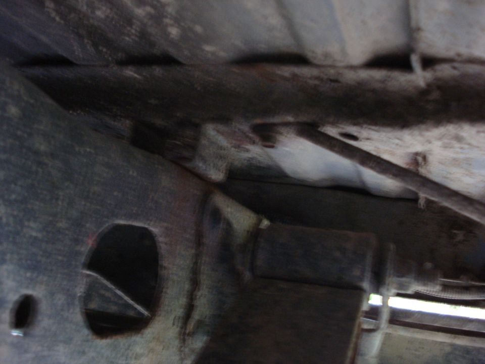 Underside view of vehicle frame and suspension components