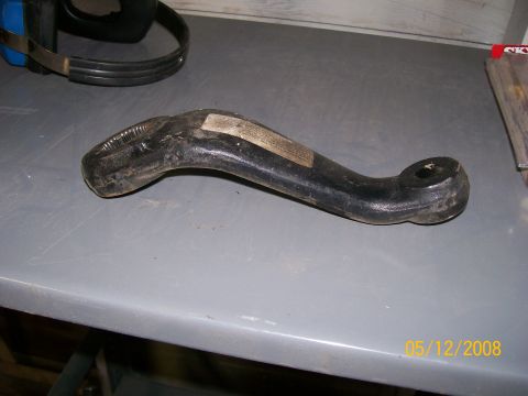 1984 Ford Bronco - A black tow hitch receiver is shown on a workbench with a pair of earmuffs in the background.