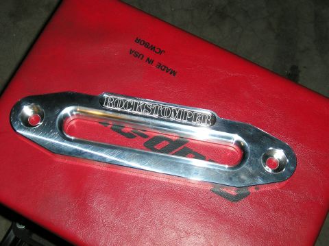 1986 Toyota Hilux - A "ROCKSTOMPER" branded winch fairlead is shown, likely an aftermarket part.