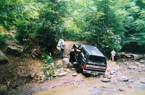 1988 Ford Bronco - This is Jim Wescot climbing the rock face at Fain's Ford, he didn't go the easy way.