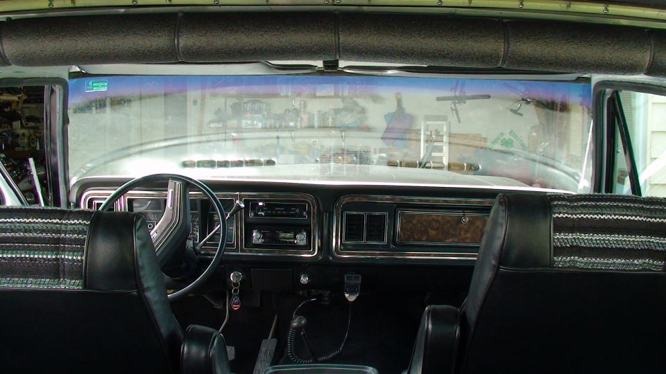 Dashboard interior with a map on the passenger side