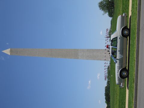 1991 Ford LTD Crown Victoria - sideways-oriented photo shows a silver State Police sedan parked beside the Washington Monument.