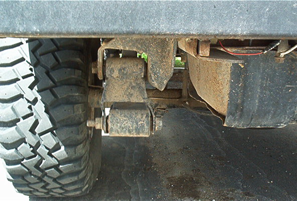 The stock shackles really aren't intended to support the wieght of the truck so some modification is necessary as you can see.