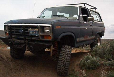 1986 Ford Bronco - This 1986 Ford Bronco features a lift kit and large off-road tires, ready for terrain.