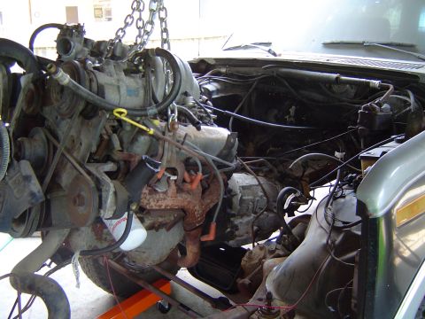 1986 Ford Bronco - Engine removal in progress from a 1986 Ford Bronco.