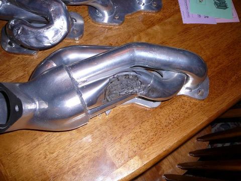 1997 Mercury Grand Marquis - This exhaust manifold shows significant damage to its internal structure.