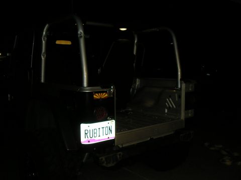 1986 Toyota Hilux - This Jeep Wrangler is seen from the rear, a custom 'RUBITON' license plate and roll cage.