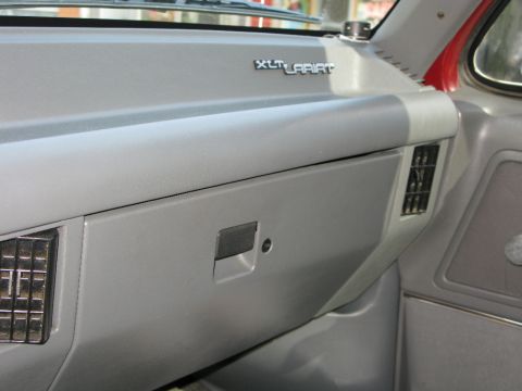 1991 Ford F-150 - The interior of a 1991 Ford F-150 shows the XLT Lariat trim on the dashboard.