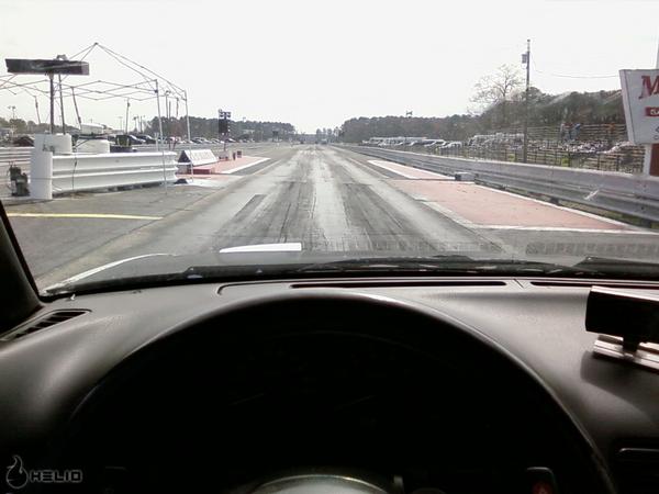 Interior view of a drag strip with a starting line and track