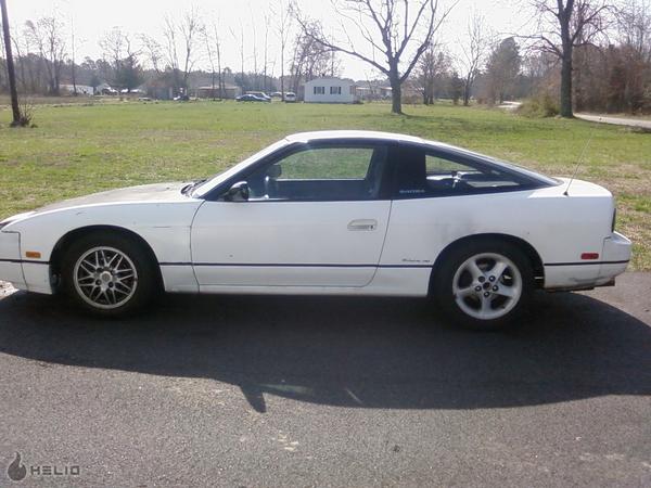 1991 Nissan 240SX coupe, side view, white exterior, black t-top roof