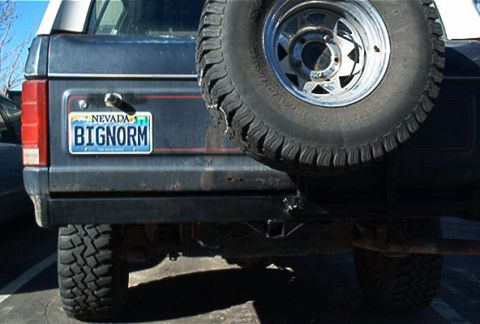 1986 Ford Bronco - This 1986 Ford Bronco features a spare tire mounted on the rear and a custom bumper.