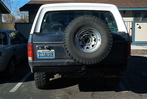 1986 Ford Bronco - Rear view of a Ford Bronco with a Nevada license plate, parked outdoors.