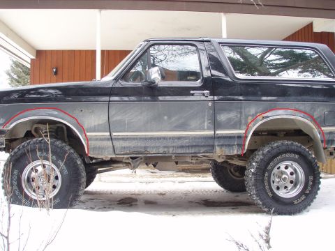 1992 Ford Bronco - i`m thinking of cutting the rust off the fenders before it spreads any more. however, i want to cut off alot! (i`m going for the baja look)…