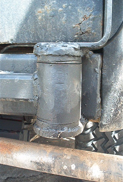 1986 Ford Bronco - close up of tire carrier hinge