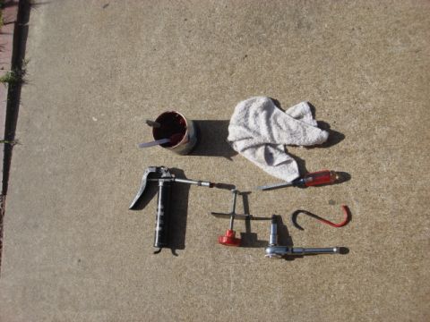1983 Ford Bronco - These are the basic tools needed to do the brake swap-----rag, grease, piston reseat tool, screw driver, 3/8 allen driver and a zip tie or…