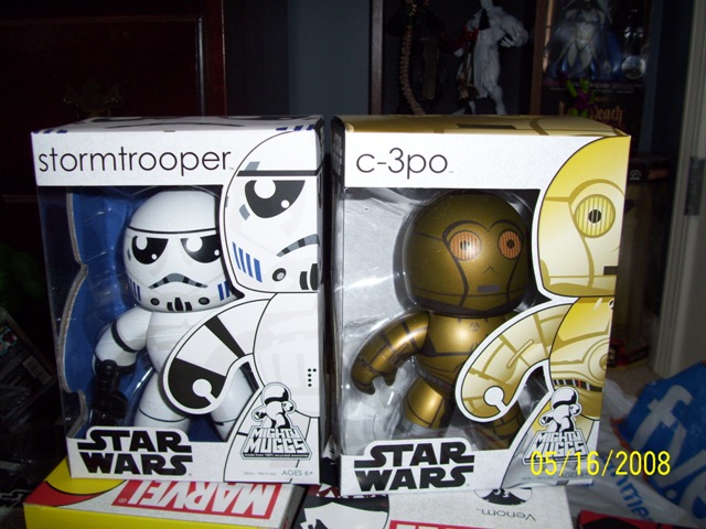 Star Wars Mighty Muggs Stormtrooper and C-3PO toys in boxes.