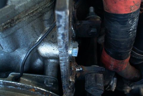 1986 Ford Bronco - Here's a close up of the tabs I welded onto the stock Volvo bracket. Basically all I did was cut some off of the backside of the bracket, r…