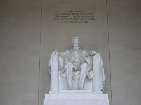 1991 Ford LTD Crown Victoria - seated white marble statue of Abraham Lincoln is centered below the full carved inscription on the memorial's interior wall.